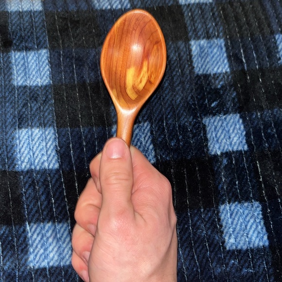 Handmade wooden spoons, two of them are red cedar one of...